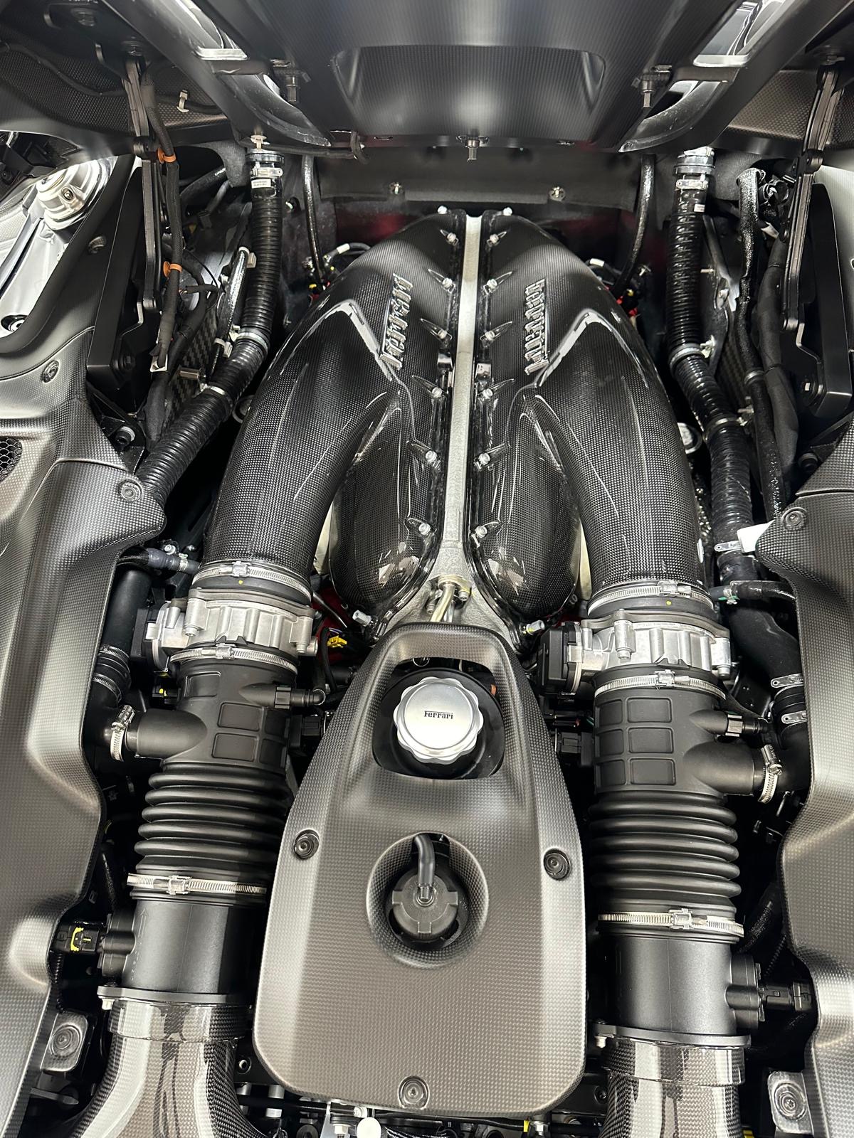 Engine bay cleaned during a full detail