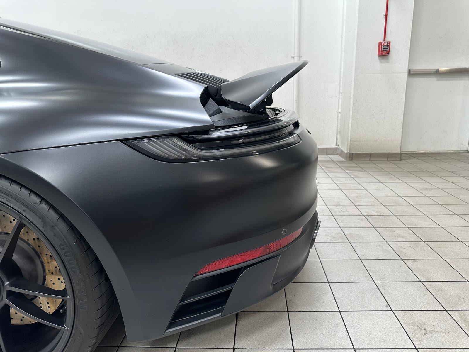 Black car detailed with a wet-look shine