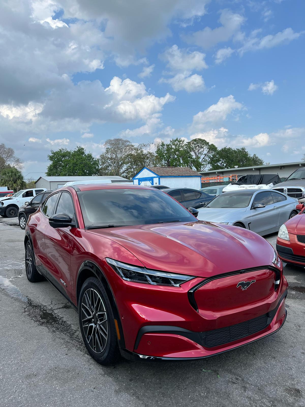 Red Ford Mustang Mach-E with fresh window tint